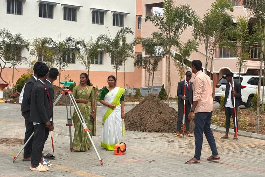 Students conducting a surveying exercise in the field