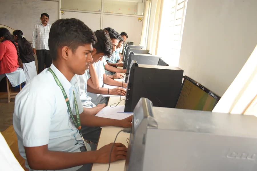 A student at a computer workstation in the EC department