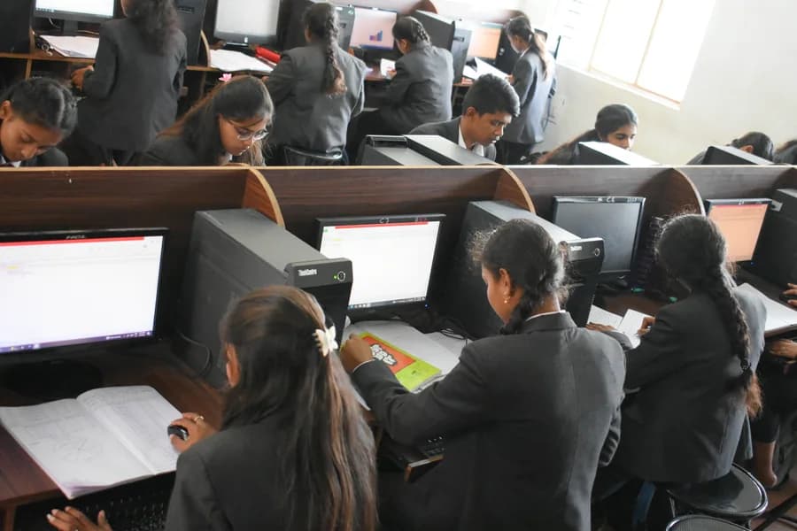 Students at computer workstations in the CS department